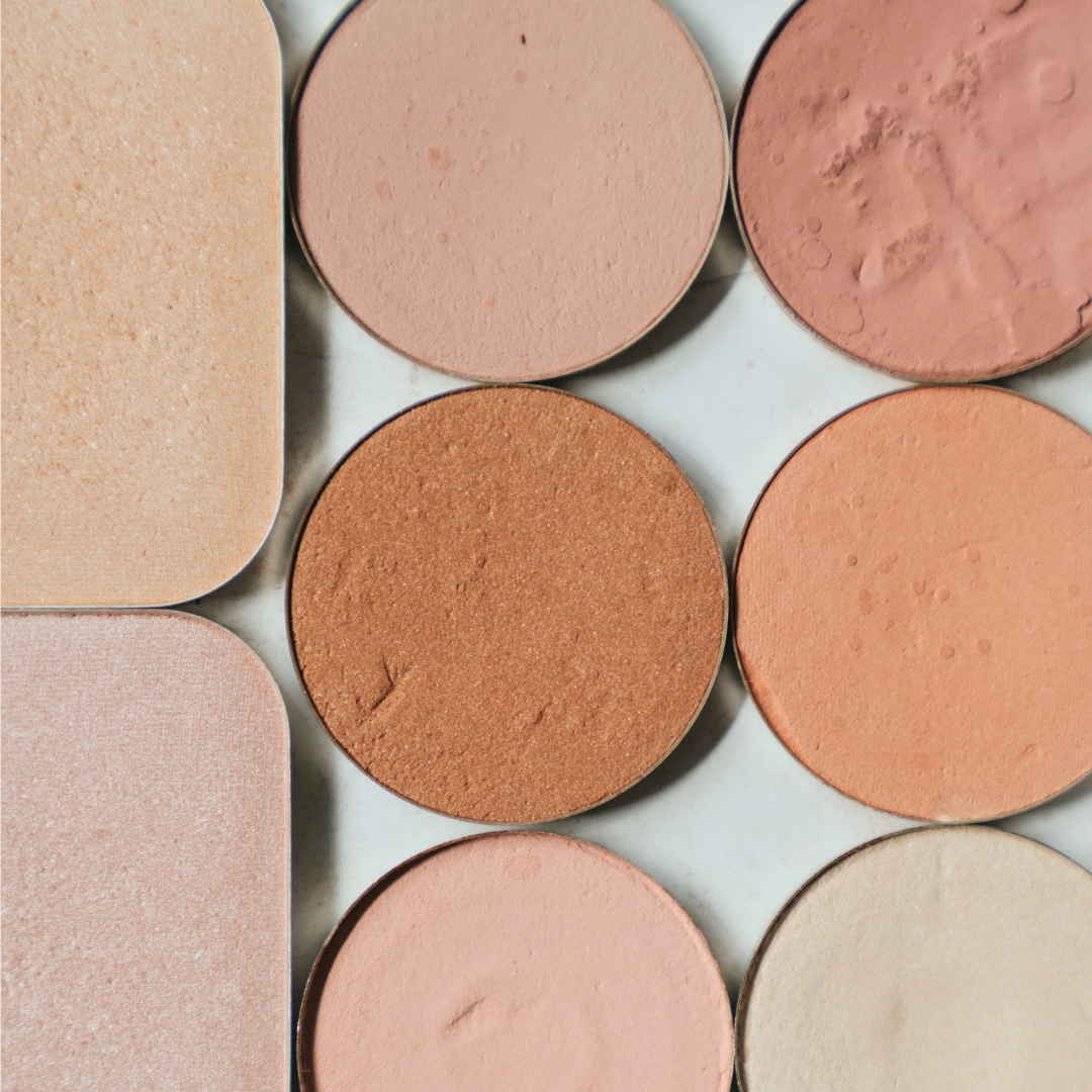 Array of neutral powder makeup in various shades