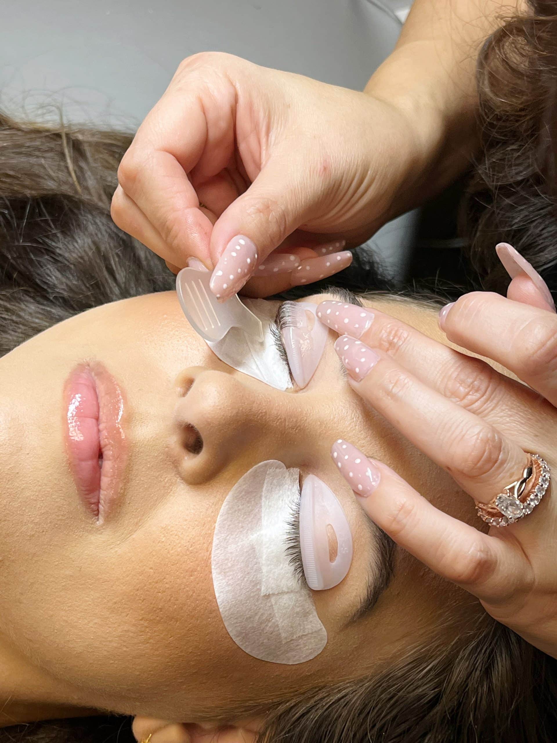 close-up of a woman receiving a lash lift at The Lash Lounge