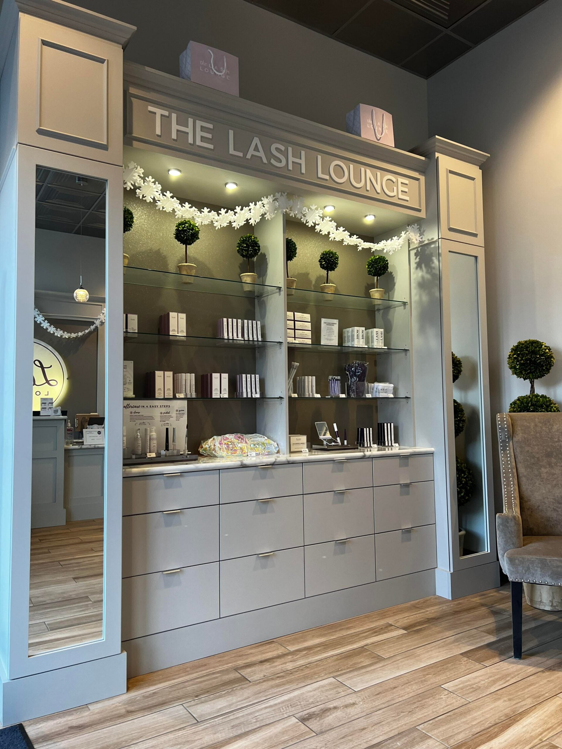 Products Wall of The Lash Lounge Lone Tree