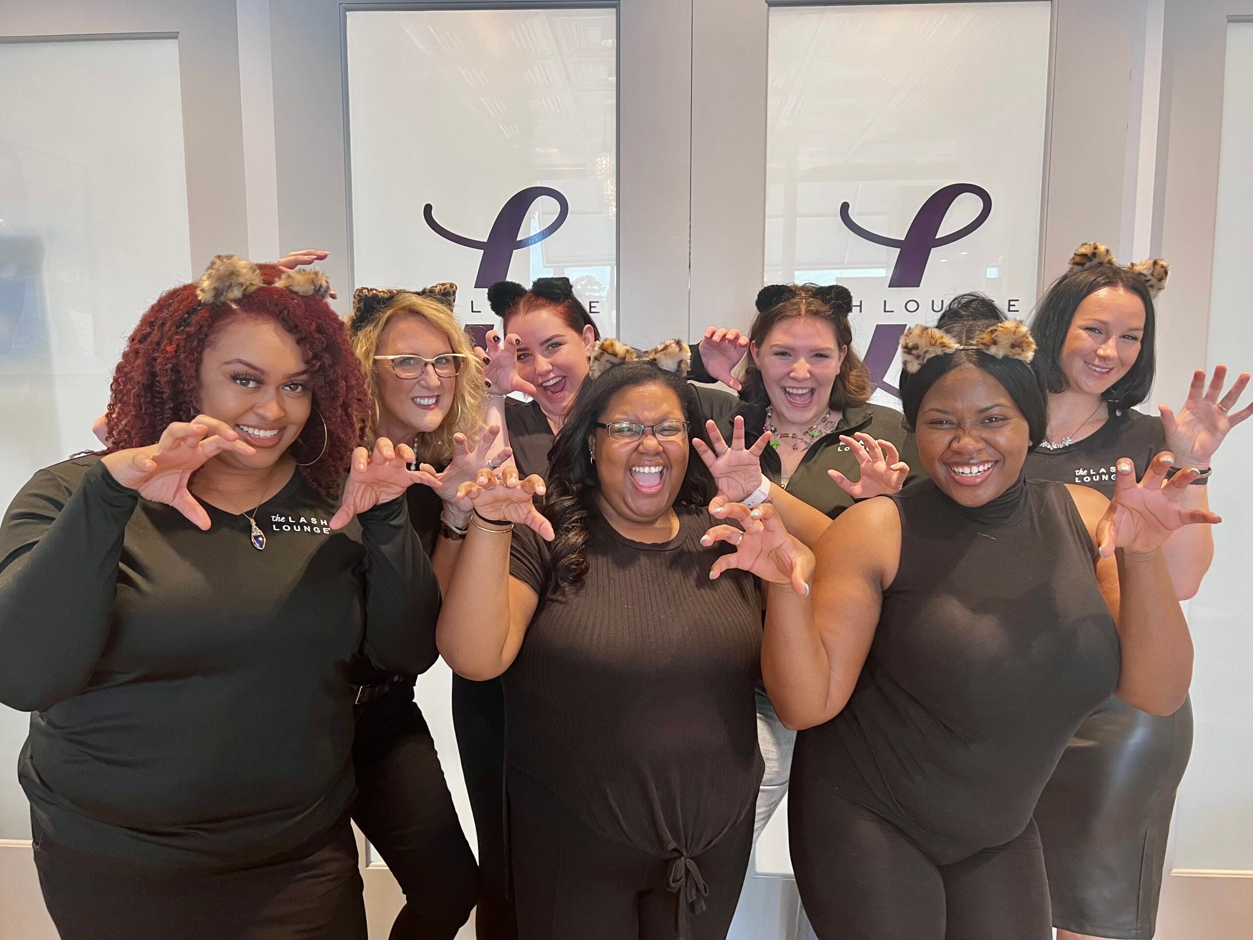 The Lash Lounge Savannah – Victory Station's staff posing together.