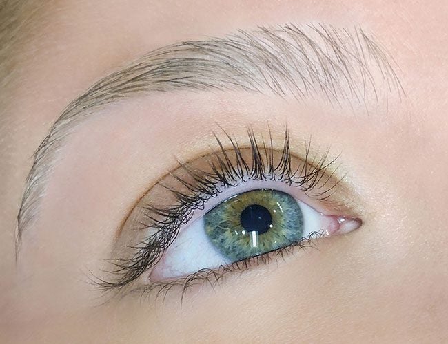 Closeup of an eye before a lash lift from The Lash Lounge.