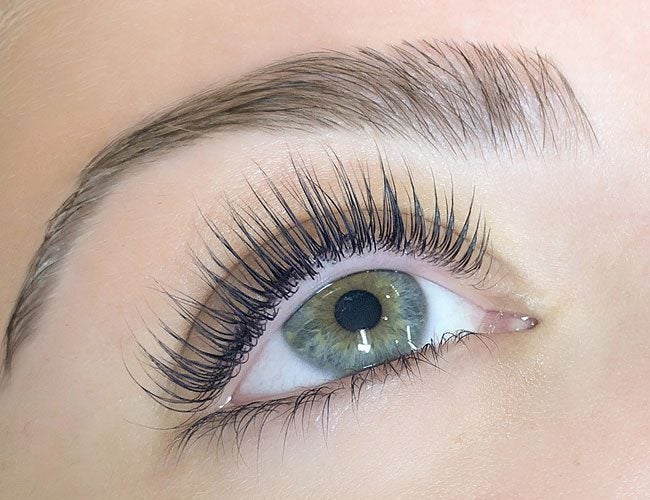 Closeup of an eye after a lash lift from The Lash Lounge.