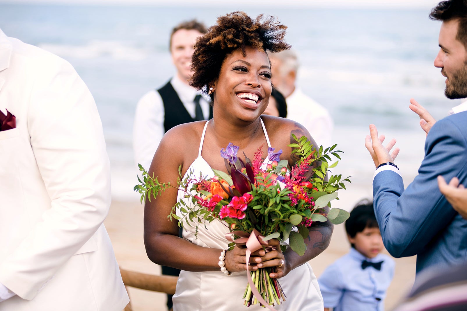 adult black womans beach wedding