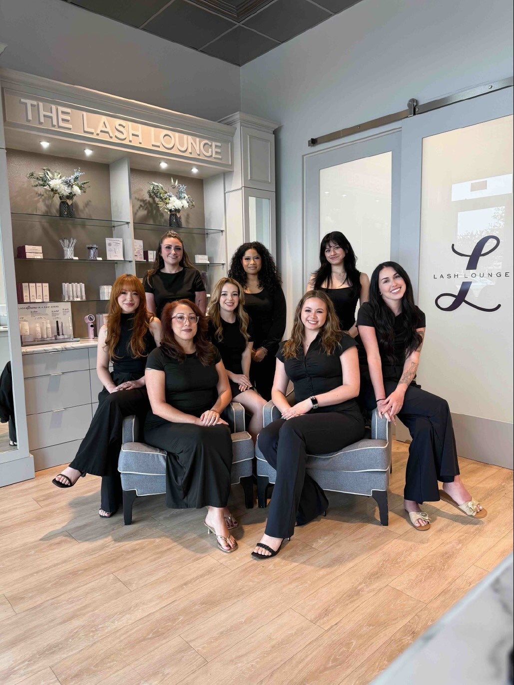 The Lash Lounge Dallas – Lakewood team sitting in lobby