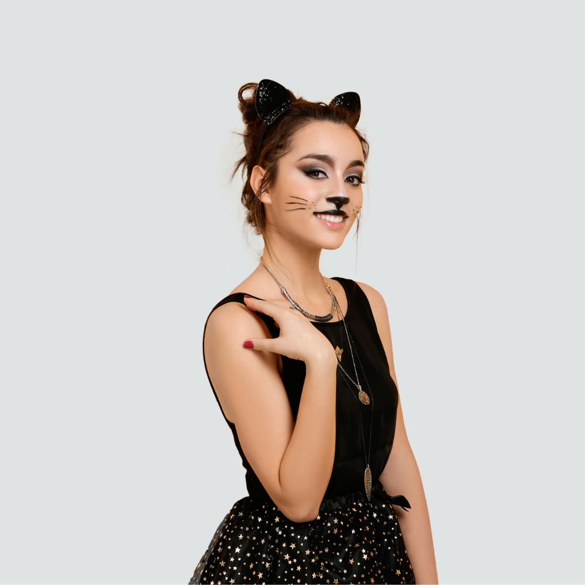 young woman dressed up as a cat