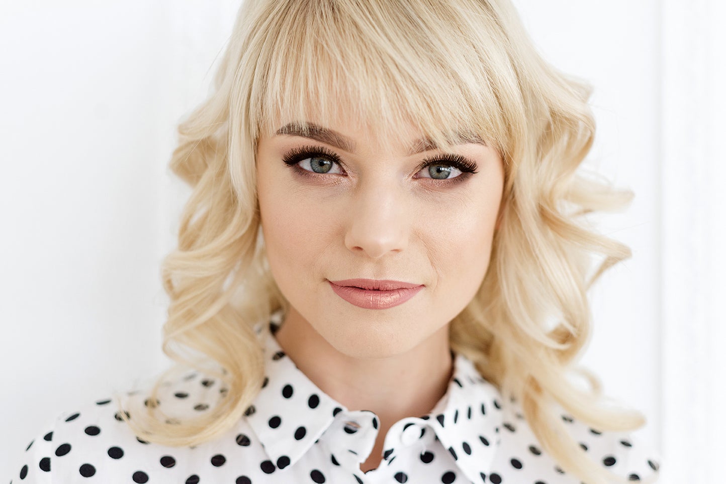 Close-up of stylish blonde woman with lash extensions