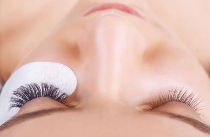 closeup of before and after a full set of lashes from The Lash Lounge