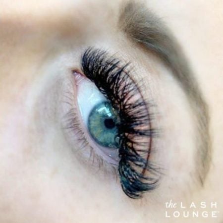lash extensions customization on an aqua blue eye from The Lash Lounge Charlotte
