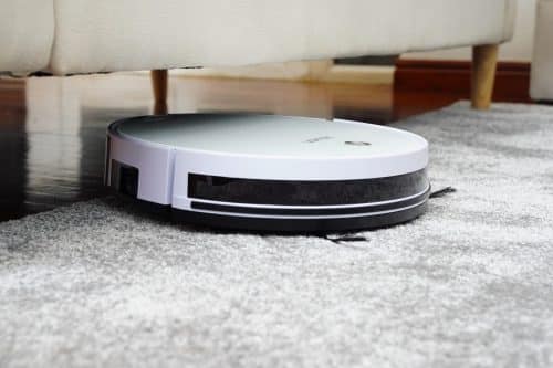 a robotic vacuum cleaning floors