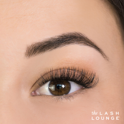 closeup of an eye with classic lash extensions from The Lash Lounge to represent the classic membership