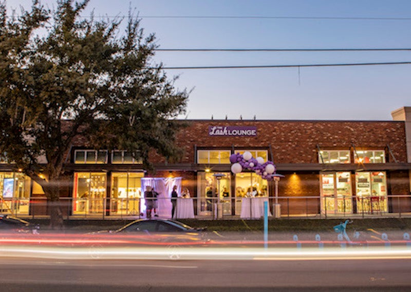An exterior shot of the 100th salon, New Orleans — Mid City, grand opening