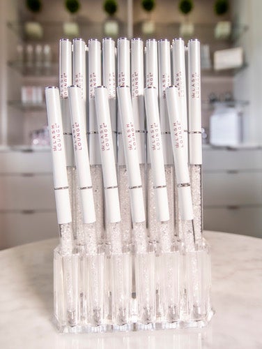 The Lash Lounge's Crystal lash wands lined up in a row