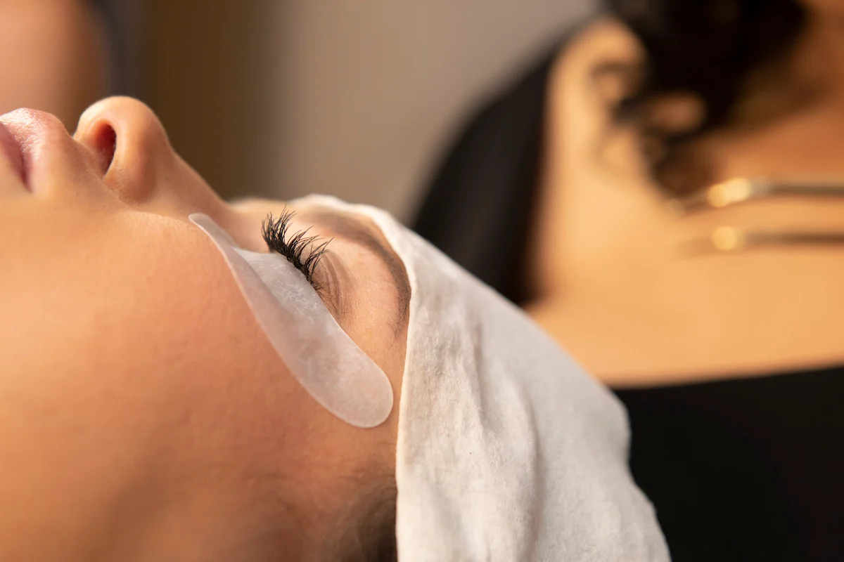 closeup of unique lash look getting refilled by stylist at The Lash Lounge