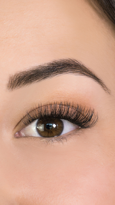 close up of woman with beautiful shaped eyebrows