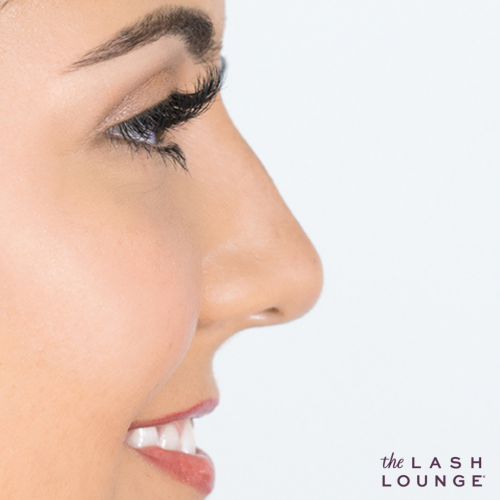 close-up side profile of a woman's face with lash extensions