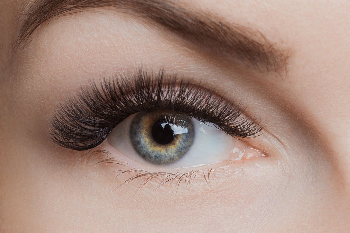 close-up of a woman's eye with volume eyelash extensions