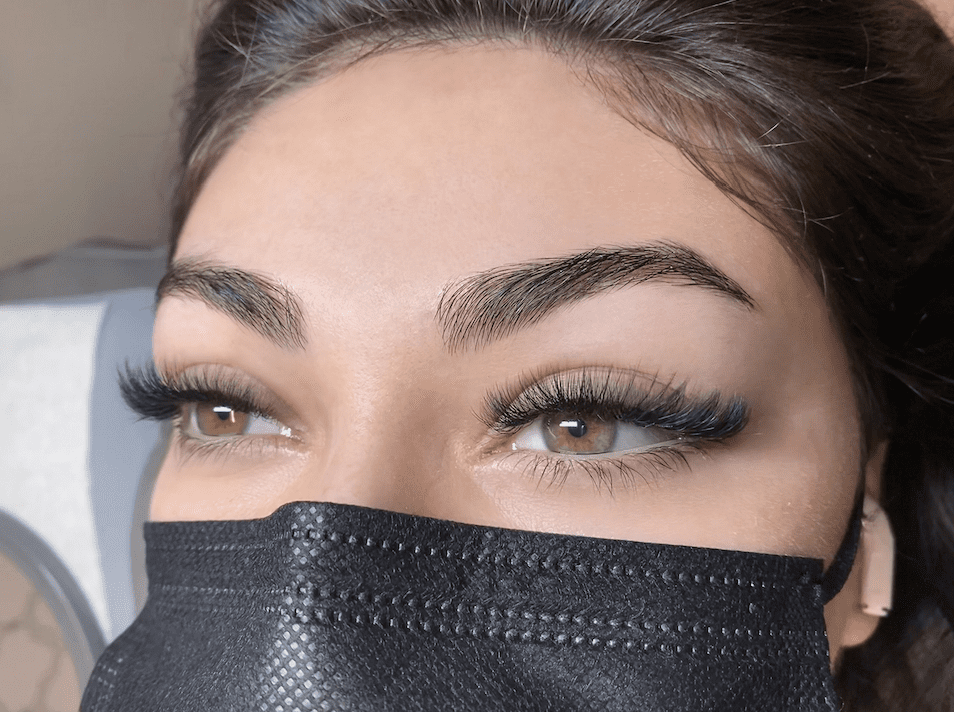 closeup of woman with eyelash extensions at the lash lounge
