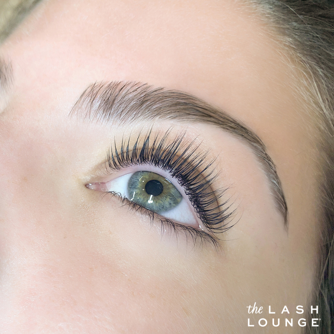 close-up of woman's eye after a lash lift service to curl her lashes