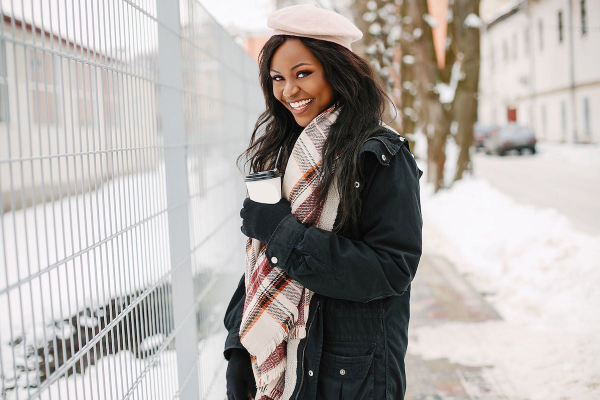 smiling black woman outdoors happy