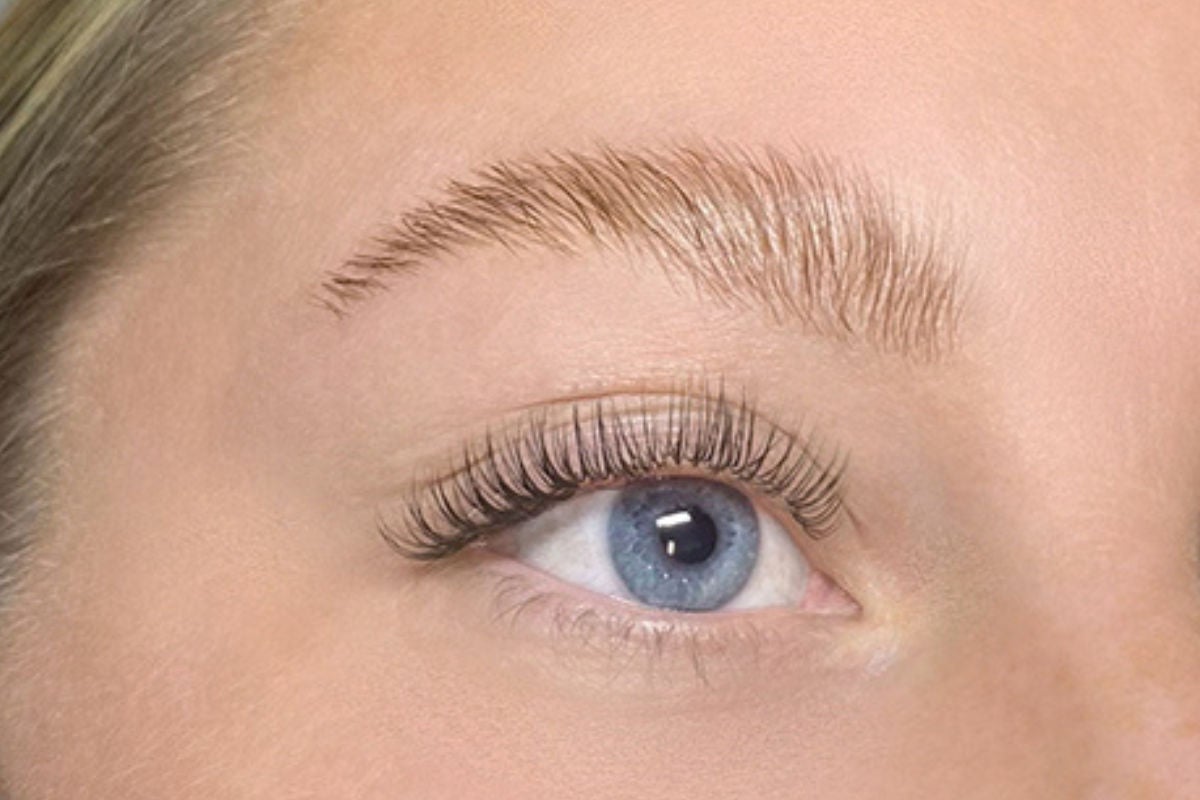 close-up of woman's eye with classic lash extensions