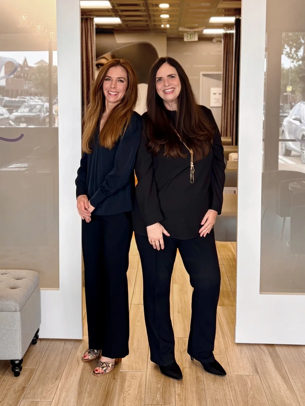 Abi Landry, franchisee, and Linda Steinhaus, manager, of The Lash Lounge Coppell – S. Denton Tap and Sandy Lake Rds.