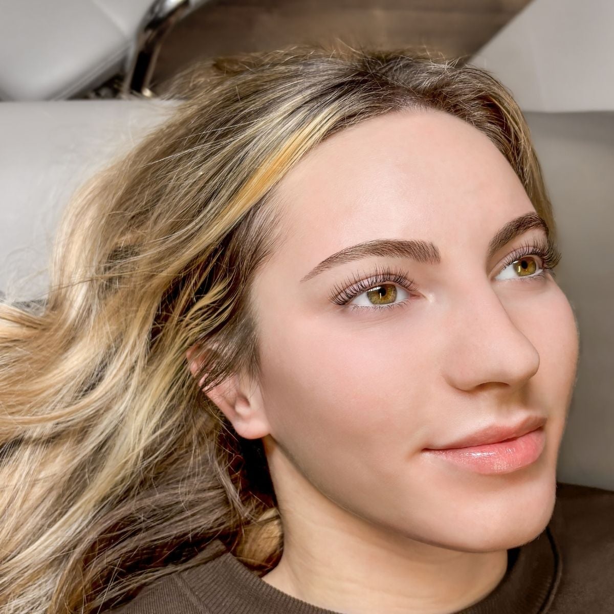 Guest after lash lift service at The Lash Lounge